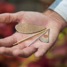 Boulder naturopathic doctor Dr. Donald Spears holding non-insertive acupuncture tools for gentle mind-body therapy in Boulder, Colorado