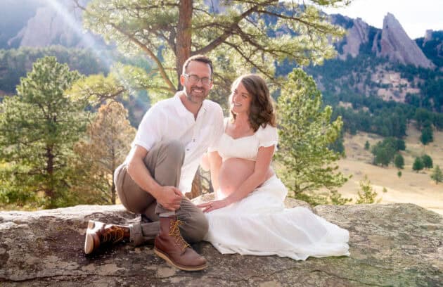 A picture of holistic doctors, Dr. Curtis and Dr. Spears, during their maternity photoshoot in Boulder, CO